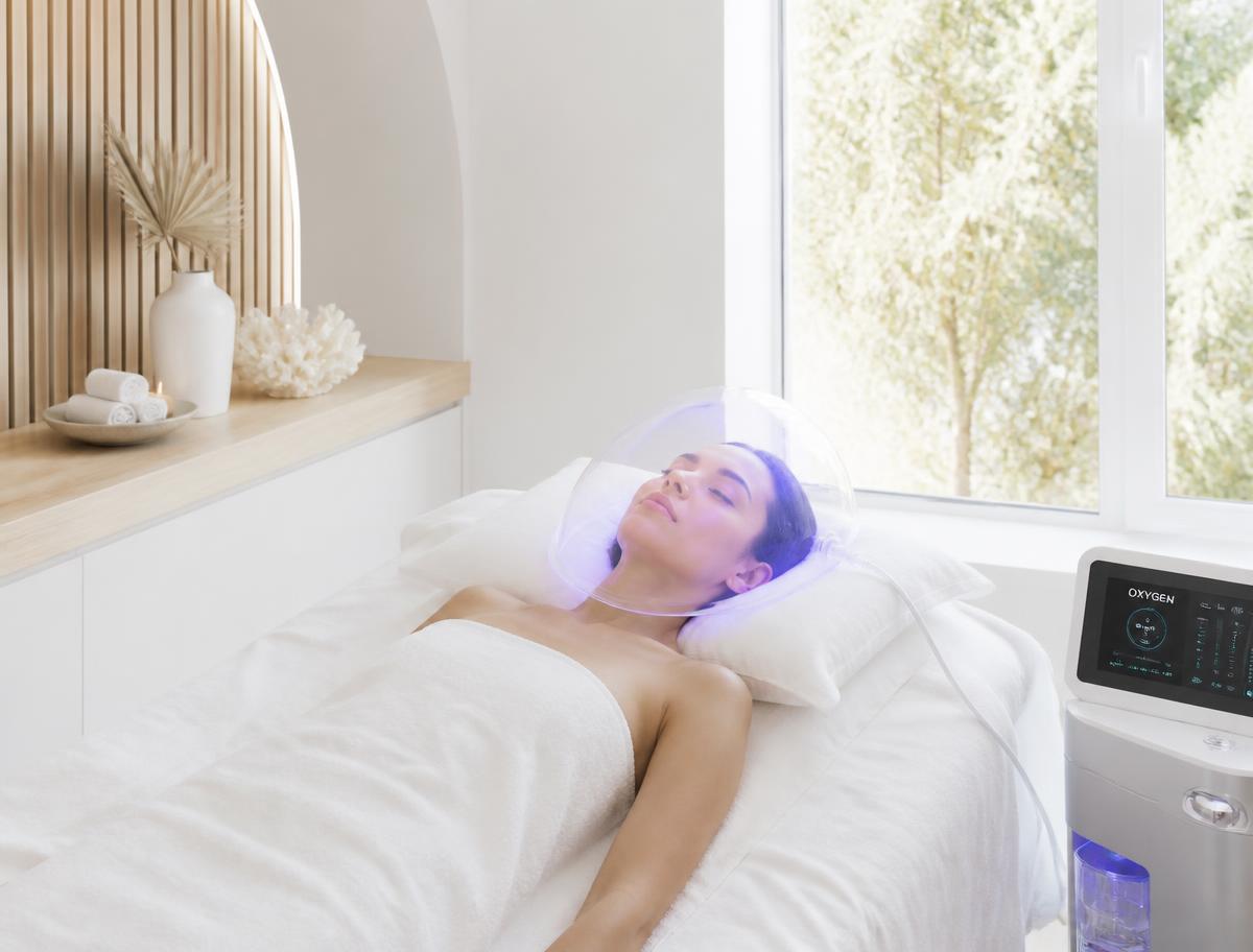 Client receiving a Glass Facial oxygen and serum treatment
